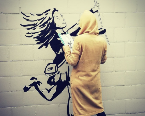 muurschildering in Banksy-stijl